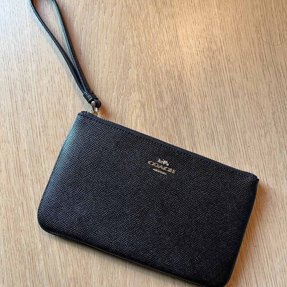 Black Coach Wristlet. Size: 8"x5". Brand new, never used